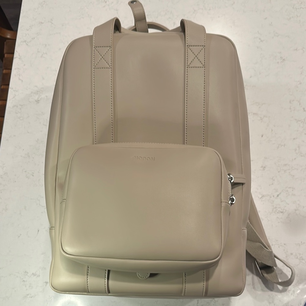 Monos backpack with additional tech case as well as attached pouch